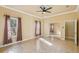 Bright bedroom with mirrored closet doors and tile flooring at 5269 61St N Way, Kenneth City, FL 33709