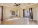 Bedroom with sliding glass doors to patio and mirrored closets at 5269 61St N Way, Kenneth City, FL 33709