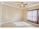 Spacious bedroom with ceiling fan and large closet at 5269 61St N Way, Kenneth City, FL 33709
