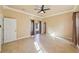 Spacious bedroom with tile floors and sliding glass door to backyard at 5269 61St N Way, Kenneth City, FL 33709