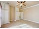 Spacious bedroom with ceiling fan and window at 5269 61St N Way, Kenneth City, FL 33709
