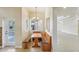 Built-in breakfast nook with wood table and bench seating at 5269 61St N Way, Kenneth City, FL 33709