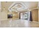 Living room with high ceilings, tile floors, and sliders to patio at 5269 61St N Way, Kenneth City, FL 33709