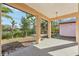 Relaxing covered patio with lake view, perfect for outdoor entertaining at 5269 61St N Way, Kenneth City, FL 33709