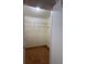 Walk-in closet featuring tile floors and wire shelving for ample storage at 6177 Chesham Dr # 6, New Port Richey, FL 34653