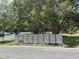 Community mailboxes with a large shade tree behind, indicating convenient services for residents at 6177 Chesham Dr # 6, New Port Richey, FL 34653
