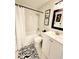 Bathroom with a bathtub, white vanity, and tiled walls at 727 83Rd N Ave # 101, St Petersburg, FL 33702