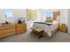 Cozy bedroom featuring a comfortable bed, wooden furniture, and a serene atmosphere at 855 3Rd N Ave, St Petersburg, FL 33701