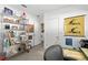 Bright hallway with shelving units displaying books and decor, leading to multiple rooms at 855 3Rd N Ave, St Petersburg, FL 33701