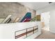 Upstairs hallway featuring modern art and an open view into the bathroom at 855 3Rd N Ave, St Petersburg, FL 33701