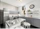 Kitchen offers sleek gray cabinets, stainless appliances, and plenty of natural light at 855 3Rd N Ave, St Petersburg, FL 33701