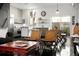 Bright living space with view of kitchen, dining table, and industrial design elements at 855 3Rd N Ave, St Petersburg, FL 33701
