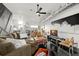 Open concept living room with concrete floors, comfortable furniture and an open floor plan at 855 3Rd N Ave, St Petersburg, FL 33701