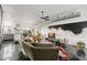 This comfortable living room with concrete floors is adjacent to the kitchen, providing a nice entertaining area at 855 3Rd N Ave, St Petersburg, FL 33701