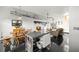 Spacious living room area with view of kitchen and outdoor light at 855 3Rd N Ave, St Petersburg, FL 33701