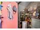 Organized pantry with metal shelves and a variety of storage containers, enhancing functionality and convenience at 855 3Rd N Ave, St Petersburg, FL 33701
