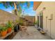 Relaxing patio with outdoor seating, potted plants, and a sliding glass door offering seamless indoor-outdoor living at 855 3Rd N Ave, St Petersburg, FL 33701