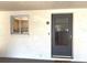 Private condo entrance with a welcoming doormat at 215 Valencia Blvd # 105, Belleair Bluffs, FL 33770