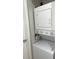 Stackable washer and dryer in closet at 215 Valencia Blvd # 105, Belleair Bluffs, FL 33770