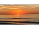 Stunning sunset over the ocean waves at 215 Valencia Blvd # 105, Belleair Bluffs, FL 33770