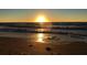 Golden sunset over gentle ocean waves at 215 Valencia Blvd # 105, Belleair Bluffs, FL 33770