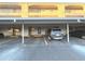 Covered carport parking with assigned parking spaces at 215 Valencia Blvd # 105, Belleair Bluffs, FL 33770