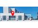 Modern building with balconies and large windows, and a bright blue sky at 226 5Th N Ave # 1502, St Petersburg, FL 33701