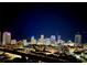 City skyline view at night featuring high-rise buildings with colorful illumination at 226 5Th N Ave # 1502, St Petersburg, FL 33701