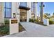 Elegant building entrance with modern design, landscaping, and clear signage at 226 5Th N Ave # 1502, St Petersburg, FL 33701