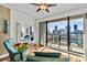 Bright living room with floor-to-ceiling windows and a view of the city skyline at 226 5Th N Ave # 1502, St Petersburg, FL 33701