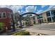 Charming downtown street view showcasing local businesses and the 'Defending Freedom' welcome archway at 3031 Countryside Blvd # 35C, Clearwater, FL 33761