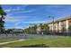 Well-maintained tennis courts surrounded by lush landscaping, providing a recreational amenity for residents at 3031 Countryside Blvd # 35C, Clearwater, FL 33761