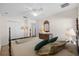 Comfortable bedroom with a traditional bed, dresser, and a mirrored closet, creating a peaceful retreat at 4275 Caskie Pl, Brooksville, FL 34604