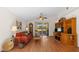 Bright living room featuring sliding glass doors and hardwood floors at 4275 Caskie Pl, Brooksville, FL 34604