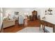 Open living space with wood floors, comfortable seating, and abundant natural light at 4275 Caskie Pl, Brooksville, FL 34604