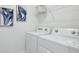 Laundry room with washer and dryer at 4492 Sand Dollar Way, Zephyrhills, FL 33541