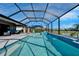 Enjoy the Florida sun in this beautiful pool with a screened enclosure and tranquil landscaping views at 9152 Warm Springs Cir, Parrish, FL 34219