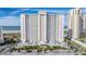 Stunning high-rise condo with direct beach access, a spacious parking lot, and lush landscaping at 1230 Gulf Blvd # 604, Clearwater Beach, FL 33767