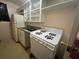 Modest kitchen space featuring essential appliances like a stove and a refrigerator at 1319 Vance Rd, Plant City, FL 33566