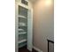 Linen closet with a bi-fold door revealing shelves filled with fresh towels at 1330 70Th N St, St Petersburg, FL 33710