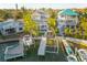 Stunning waterfront home with private dock, pool, and lush tropical landscaping; ideal for luxurious coastal living at 238 71St Ave, St Pete Beach, FL 33706