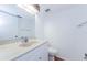 Bathroom featuring a white vanity with light countertop and tile flooring at 11805 Northtrail Ave, Temple Terrace, FL 33617