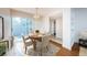 Charming dining area with wood table, seating for four, and natural light at 11805 Northtrail Ave, Temple Terrace, FL 33617