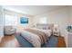 Comfortable main bedroom with a plush bed, soft carpet, and ample natural light at 11805 Northtrail Ave, Temple Terrace, FL 33617