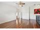 Spacious bonus room showcases gleaming wood floors, neutral paint, and an airy open layout at 15815 Muirfield Dr, Odessa, FL 33556