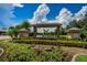 Beautiful community entrance sign, with lush landscaping, and an inviting atmosphere at 15815 Muirfield Dr, Odessa, FL 33556