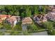 Spacious homes boast tile roofs, lush landscaping, and verdant tree backdrops, offering privacy and curb appeal at 20314 Chestnut Grove Dr, Tampa, FL 33647