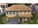 This aerial view highlights the home's tile roof at 20314 Chestnut Grove Dr, Tampa, FL 33647