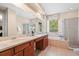 Spacious bathroom with double vanity and a separate shower and tub at 20314 Chestnut Grove Dr, Tampa, FL 33647