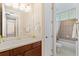 Bathroom featuring a vanity with sink, a bathtub, and a toilet at 20314 Chestnut Grove Dr, Tampa, FL 33647